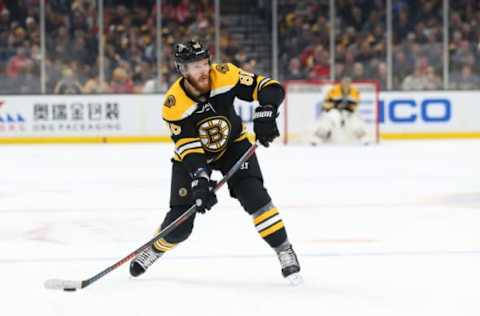 BOSTON, MASSACHUSETTS – JANUARY 10: Kevan Miller #86 of the Boston Bruins takes a shot against the Washington Capitals during the first period at TD Garden on January 10, 2019 in Boston, Massachusetts. (Photo by Maddie Meyer/Getty Images)