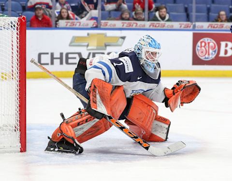 BUFFALO, NY – DECEMBER 30: Ukko-Pekka Luukkonen #1 of Finland defends his net against Slovakia during the first period of play in the IIHF World Junior Championships at the KeyBank Center on December 30, 2017 in Buffalo, New York. (Photo by Nicholas T. LoVerde/Getty Images)