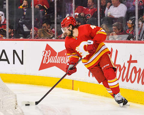 CALGARY, AB – MAY 20: Rasmus Andersson #4 of the Calgary Flames in action against the Edmonton Oilers during Game Two of the Second Round of the 2022 Stanley Cup Playoffs at Scotiabank Saddledome on May 20, 2022 in Calgary, Alberta, Canada. The Oilers defeated the Flames 5-3. (Photo by Derek Leung/Getty Images)