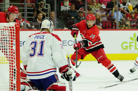 RALEIGH, NC – OCTOBER 3: Sebastian Aho #20 of the Carolina Hurricanes shoots the puck as Carey Price #31 of the Montreal Canadiens makes the save during an NHL game on October 3, 2019 at PNC Arena in Raleigh North Carolina. (Photo by Gregg Forwerck/NHLI via Getty Images)