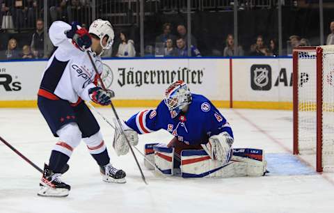 Apr 29, 2022; New York, New York, USA; New York Rangers goalie Alexandar Georgiev (40) makes a save on Washington Capitals right wing Garnet Hathaway (21) during the third period at Madison Square Garden. Mandatory Credit: Danny Wild-USA TODAY Sports