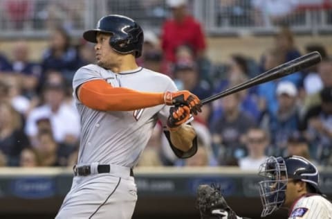 Jun 8, 2016; Minneapolis, MN, USA; Miami Marlins right fielder Giancarlo Stanton (27) hits a RBI single in the fifth inning against the Minnesota Twins at Target Field. Mandatory Credit: Jesse Johnson-USA TODAY Sports