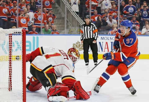 Oct 12, 2016; Edmonton, Alberta, CAN; Edmonton Oilers forward Connor McDavid (97) scores on a penalty shot in the second period against the Calgary Flames goaltender Brian Elliott (1) at Rogers Place. Mandatory Credit: Perry Nelson-USA TODAY Sports