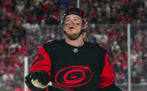 Feb 18, 2023; Raleigh, North Carolina, USA; Carolina Hurricanes right wing Andrei Svechnikov (37) looks on against the Washington Capitals during the 2023 Stadium Series ice hockey game at Carter-Finley Stadium. Mandatory Credit: James Guillory-USA TODAY Sports