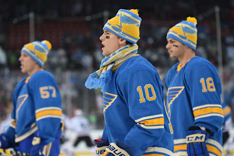 ST LOUIS, MO – JANUARY 02: (L-R) David Perron #57, Scottie Upshall #10 and Ty Rattie #18 of the St. Louis Blues wear their snow caps during warm-up prior to the 2017 Bridgestone NHL Winter Classic at Busch Stadium on January 2, 2017 in St Louis, Missouri. (Photo by Brian Babineau/NHLI via Getty Images)