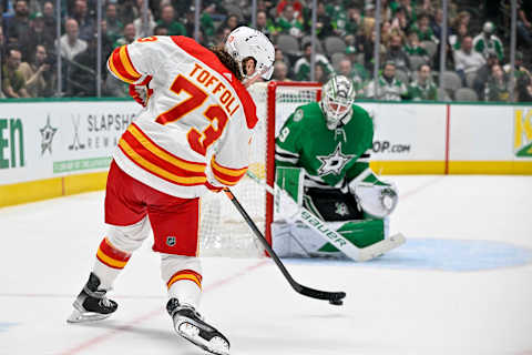 March 6, 2023; Dallas, Texas, USA; Dallas Stars goaltender Jake Oettinger (29) stops a shot by Calgary Flames right wing Tyler Toffoli (73) during the first period at the American Airlines Center. Mandatory Credit: Jerome Miron-USA TODAY Sports