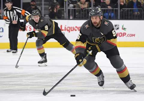 Deryk Engelland of the Vegas Golden Knights skates with the puck against the Arizona Coyotes in the second period of their game at T-Mobile Arena.