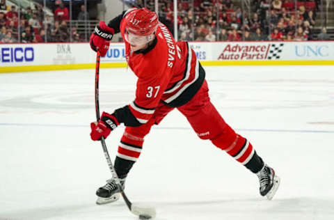 RALEIGH, NC – SEPTEMBER 29: Carolina Hurricanes right wing Andrei Svechnikov (37) shoots the puck on net during an NHL Preseason game between the Washington Capitals and the Carolina Hurricanes on September 29, 2019 at the PNC Arena in Raleigh, NC. (Photo by Greg Thompson/Icon Sportswire via Getty Images)