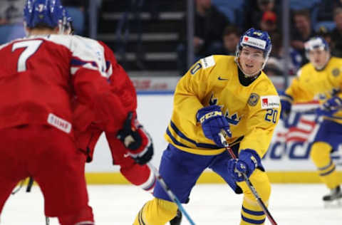 BUFFALO, NY: Isac Lundestrom #20 of Sweden skates up ice with the puck in the third period against the Czech Republic during the IIHF World Junior Championship at KeyBank Center on December 28, 2017, in Buffalo, New York. Sweden beat Czech Republic 3-1. (Photo by Kevin Hoffman/Getty Images)