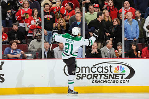 CHICAGO, IL – DECEMBER 3: Antoine Roussel #21 of the Dallas Stars reacts after scoring his penalty shot in the third period against the Chicago Blackhawks during the NHL game on December 03, 2013 at the United Center in Chicago, Illinois. (Photo by Bill Smith/NHLI via Getty Images)