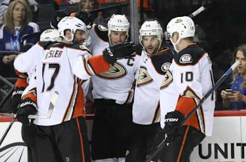 NHL Power Rankings: Anaheim Ducks center Ryan Getzlaf (15) celebrates his goal with teammates during the third period against New York Islanders at Barclays Center. New York Islanders won 3-2 in overtime. Mandatory Credit: Anthony Gruppuso-USA TODAY Sports