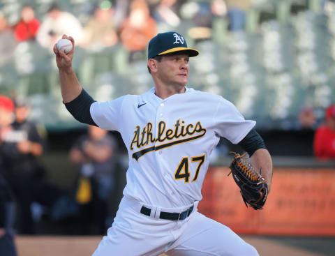 Apr 28, 2023; Oakland, California, USA; Oakland Athletics starting pitcher Drew Rucinski (47) pitches the ball against the Cincinnati Reds during the first inning at Oakland Coliseum. Mandatory Credit: Kelley L Cox-USA TODAY Sports