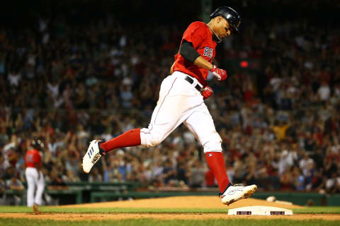 BOSTON, MA – MAY 25: Xander Bogaerts #2 of the Boston Red Sox steps on first base as he rounds the bases after hitting a solo home run in the fourth inning of a game against the Atlanta Braves at Fenway Park on May 25, 2018, in Boston, Massachusetts. (Photo by Adam Glanzman/Getty Images)