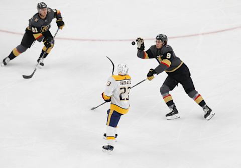 LAS VEGAS, NV – OCTOBER 15: Vegas Golden Knights center Cody Glass (9) reaches for the puck during the first period of a regular season game between the Nashville Predators and the Vegas Golden Knights Tuesday, Oct. 15, 2019, at T-Mobile Arena in Las Vegas, Nevada. (Photo by: Marc Sanchez/Icon Sportswire via Getty Images)