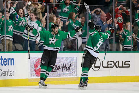 DALLAS, TX – NOVEMBER 21: Dallas Stars Left Wing Jamie Benn (14) celebrates his game winning goal with Center Tyler Seguin (91) who provided the primary assist during overtime of the NHL game between the Minnesota Wild and Dallas Stars on November 21, 2016, at the American Airlines Center in Dallas, TX. Dallas defeats Minnesota 3-2 in overtime. (Photo by Andrew Dieb/Icon Sportswire via Getty Images)