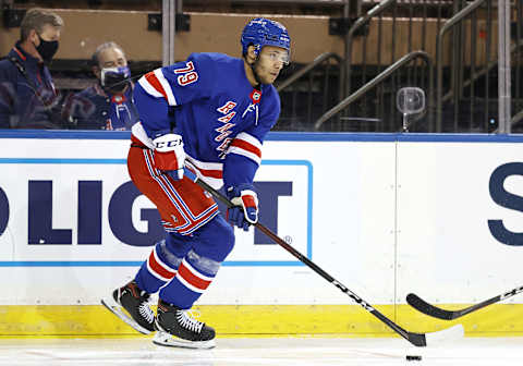 NEW YORK, NEW YORK – APRIL 22: K’Andre Miller #79 of the New York Rangers takes the puck in the third period against the Philadelphia Flyers at Madison Square Garden on April 22, 2021 in New York City.The Philadelphia Flyers defeated the New York Rangers 3-2. (Photo by Elsa/Getty Images)