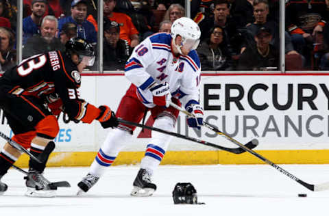 ANAHEIM, CA – JANUARY 7: Marc Staal #18 of the New York Rangers handles the puck against Jakob Silfverberg #33 of the Anaheim Ducks on January 7, 2015, at theHonda Center in Anaheim, California. (Photo by Debora Robinson/NHLI via Getty Images)