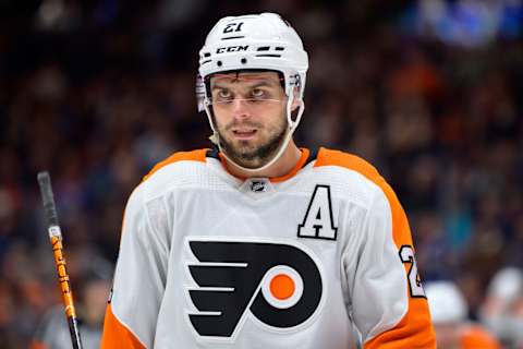 Flyers forward Scott Laughton waits for a face-off during against the Vancouver Canucks. (Photo by Derek Cain/Getty Images)