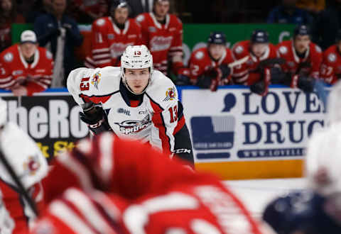 Will Cuylle #13 of the Windsor Spitfires looks on before a face-off during an OHL game. (Photo by Chris Tanouye/Getty Images)