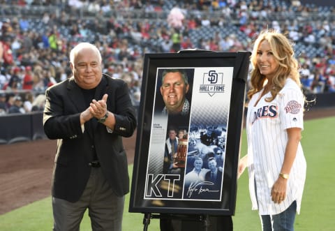 SAN DIEGO, CA – MAY 12: Kelley Towers, wife of former San Diego Padres general manager Kevin Towers, stands with Ron Fowler, Padres’ executive chairman, in a pre-game tribute to the members of the 1998 San Diego Padres National League West Championship team before a baseball game against the St. Louis Cardinals at PETCO Park on May 12, 2018 in San Diego, California. (Photo by Denis Poroy/Getty Images) *** Local Caption *** Kelley Towers;Ron Fowler