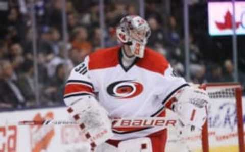 Feb 25, 2016; Toronto, Ontario, CAN; Carolina Hurricanes goaltender Cam Ward (30) during a break in the action against the Toronto Maple Leafs during the second period at the Air Canada Centre. Mandatory Credit: John E. Sokolowski-USA TODAY Sports