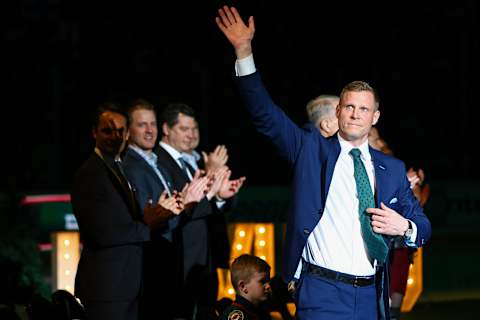 Mar 13, 2022; Saint Paul, Minnesota, USA; Former Minnesota Wild center Mikko Koivu acknowledges the crowd during his jersey number retirement ceremony prior to the game against the Nashville Predators at Xcel Energy Center. Mandatory Credit: Harrison Barden-USA TODAY Sports