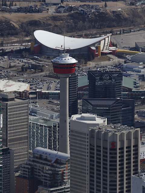 CALGARY, CANADA – FEBRUARY 26: An aerial view of the Calgary Tower and the Scotiabank Saddledome the home of the NHLâs Calgary Flames and partial view of the skyline as seen from above on February 26, 2016 in Calgary, Alberta. (Photo by Tom Szczerbowski/Getty Images)