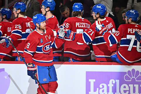 MONTREAL, CANADA – NOVEMBER 12: Mike Matheson #8 of the Montreal Canadiens celebrates his goal with teammates on the bench during the third period against the Vancouver Canucks at the Bell Centre on November 12, 2023 in Montreal, Quebec, Canada. The Vancouver Canucks defeated the Montreal Canadiens 5-2. (Photo by Minas Panagiotakis/Getty Images)