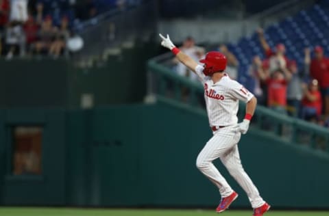 Hoskins signals to the pen that the offense is giving them a lead to protect. Photo by Rich Schultz/Getty Images.