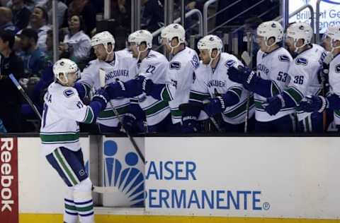 Mar 7, 2015; San Jose, CA, USA; Vancouver Canucks right wing Radim Vrbata (17) celebrates with the Vancouver Canucks bench after scoring a goal during the first period against the San Jose Sharks at SAP Center at San Jose. Mandatory Credit: Bob Stanton-USA TODAY Sports