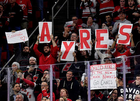 RALEIGH, NORTH CAROLINA – FEBRUARY 25: Fans cheer for Dave Ayres during the game between the Dallas Stars and Carolina Hurricanes at at PNC Arena on February 25, 2020 in Raleigh, North Carolina.  (Photo by Grant Halverson/Getty Images)