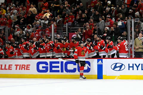 Dec 23, 2022; Chicago, Illinois, USA; Chicago Blackhawks right wing Patrick Kane (88) celebrates with teammates after he scored a goal against the Columbus Blue Jackets during the first period at the United Center. Mandatory Credit: Matt Marton-USA TODAY Sports