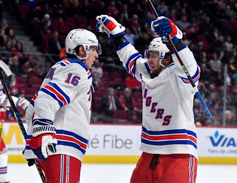 New York Rangers forward Ryan Strome (16) reacts with teammate Artemi Panarin (10) Mandatory Credit: Eric Bolte-USA TODAY Sports