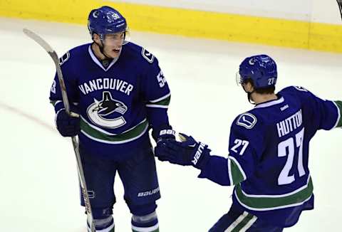 Jan 6, 2016; Vancouver, British Columbia, CAN; Vancouver Canucks forward Bo Horvat (53) reacts after scoring against the Carolina Hurricanes in the third period at Rogers Arena. The Vancouver Canucks won 3-2. Mandatory Credit: Anne-Marie Sorvin-USA TODAY Sports