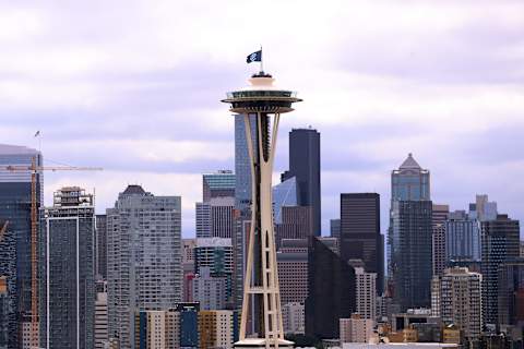 A general view of the Seattle skyline with the Seattle Kraken flag (Photo by Abbie Parr/Getty Images)