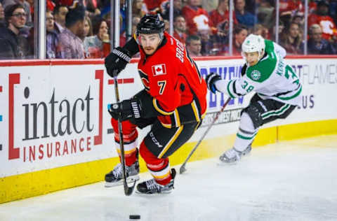 Nov 10, 2016; Calgary, Alberta, CAN; Calgary Flames defenseman TJ Brodie (7) controls the puck against the Dallas Stars during the third period at Scotiabank Saddledome. Dallas Stars won 4-2. Mandatory Credit: Sergei Belski-USA TODAY Sports