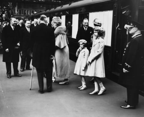 Princesses Elizabeth (right) and Margaret at Waterloo Station, London, 1939.