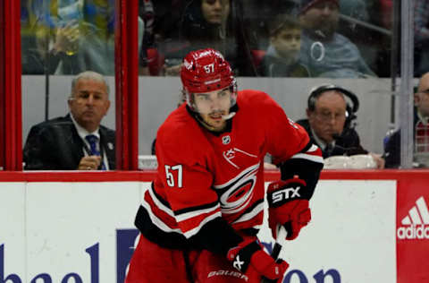 RALEIGH, NC – FEBRUARY 2: Trevor van Reimsdyk #57 of the Carolina Hurricanes manages the puck in the neutral zone during an NHL game against the Vancouver Canucks on February 2, 2020 at PNC Arena in Raleigh, North Carolina. (Photo by Gregg Forwerck/NHLI via Getty Images)