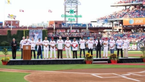 Jul 31, 2015; Philadelphia, PA, USA; Philadelphia Phillies legends help honor Pat Burrell as the 37th inductee into the Phillies Wall of Fame before a game against the Atlanta Braves at Citizens Bank Park. Mandatory Credit: Bill Streicher-USA TODAY Sports