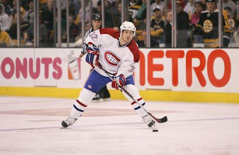 BOSTON – MARCH 3: Mark Streit #32 of the Montreal Canadiens passes the puck against the Boston Bruins on March 3, 2007 at TD Banknorth Garden in Boston, Massachusetts. The Bruins won 3-1. (Photo by Elsa/Getty Images)