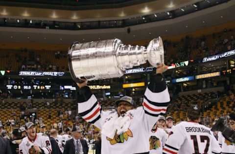 BOSTON, MA – JUNE 24: Ray Emery #30 of the Chicago Blackhawks celebrates with the Stanley Cup after Game Six of the 2013 NHL Stanley Cup Final on June 24, 2013. (Photo by Bruce Bennett/Getty Images)