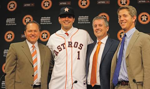 HOUSTON, TX – JUNE 19: (L-R) Agent Scott Boras, Mark Appel, general managerJeff Luhnow and director of amateur scouting Mike Elias pose for the media after the Houston Astros signed first overall draft pick Appel to the team prior to the start of the game between the Milwaukee Brewers and the Houston Astros at Minute Maid Park on June 19, 2013 in Houston, Texas. (Photo by Scott Halleran/Getty Images)