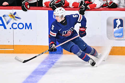 HALIFAX, CANADA – JANUARY 04: Gavin Brindley #5 of Team United States skates during the first period against Team Canada in the semifinal round of the 2023 IIHF World Junior Championship at Scotiabank Centre on January 4, 2023 in Halifax, Nova Scotia, Canada. Team Canada defeated Team United States 6-2. (Photo by Minas Panagiotakis/Getty Images)