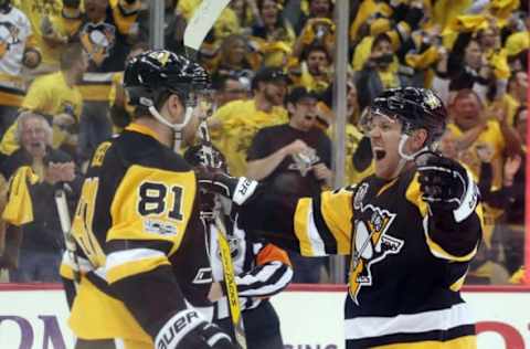 Apr 12, 2017; Pittsburgh, PA, USA; Pittsburgh Penguins right wing Phil Kessel (81) celebrates with right wing Patric Hornqvist (72) after scoring a goal the Columbus Blue Jackets during the second period in game one of the first round of the 2017 Stanley Cup Playoffs at PPG PAINTS Arena. Mandatory Credit: Charles LeClaire-USA TODAY Sports