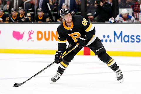 BOSTON, MA – NOVEMBER 29: Boston Bruins right wing David Pastrnak (88) lines up a shot during a game between the Boston Bruins and the New York Rangers on November 29, 2019, at TD Garden in Boston, Massachusetts. (Photo by Fred Kfoury III/Icon Sportswire via Getty Images)