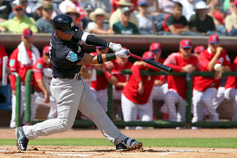 CLEARWATER, FL – FEBRUARY 25: Gleyber Torres (81) of the Yankees hits a line drive thru the infield during the spring training game between the New York Yankees and the Philadelphia Phillies on February 25, 2018, at Spectrum Field in Clearwater, FL. (Photo by Cliff Welch/Icon Sportswire via Getty Images)