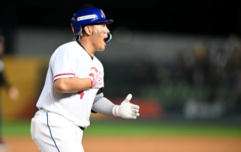 Kungkuan Giljegilaw hits a three run homerun at the bottom of the 8th inning during the World Baseball Classic Pool A game between Italy and Chinese Taipei. (Photo by Gene Wang/Getty Images)