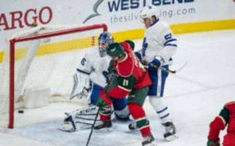 Oct 20, 2016; Saint Paul, MN, USA; Toronto Maple Leafs goalie Jhonas Enroth (35) allows a goal to Minnesota Wild forward Eric Staal (not pictured) in front of forward Zach Parise (11) during the third period at Xcel Energy Center. The Wild defeated the Maple Leafs 3-2. Mandatory Credit: Brace Hemmelgarn-USA TODAY Sports