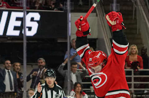 RALEIGH, NC – OCTOBER 06: Carolina Hurricanes Center Erik Haula (56) reacts after a puck is scored past Tampa Bay Lightning Goalie Curtis McElhinney (35) during a game between the Tampa Bay Lightning and the Carolina Hurricanes at the PNC Arena in Raleigh, NC on October 6, 2019.(Photo by Greg Thompson/Icon Sportswire via Getty Images)