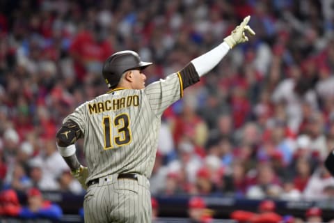 Oct 22, 2022; Philadelphia, Pennsylvania, USA; San Diego Padres third baseman Manny Machado (13) gestures after hitting a home run in the first inning during game four of the NLCS against the Philadelphia Phillies for the 2022 MLB Playoffs at Citizens Bank Park.Mandatory Credit: Eric Hartline-USA TODAY Sports